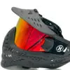 Black paintball mask with red lens.