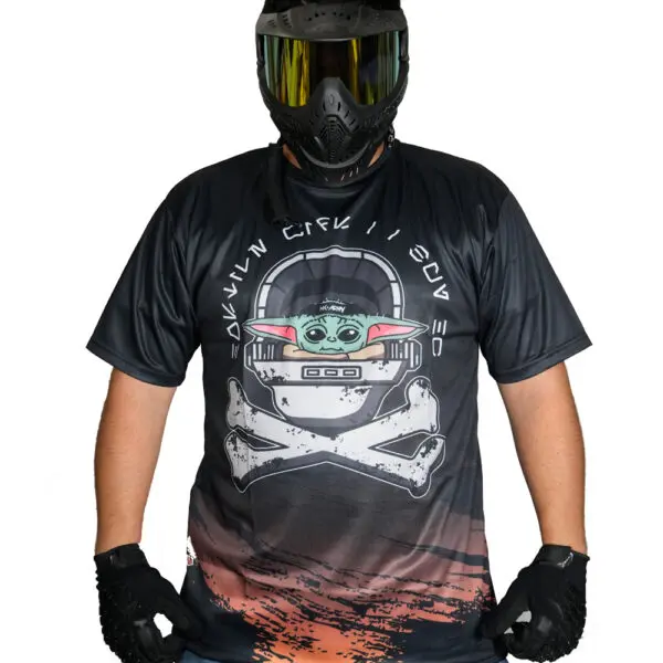 Person in paintball gear with graphic shirt.
