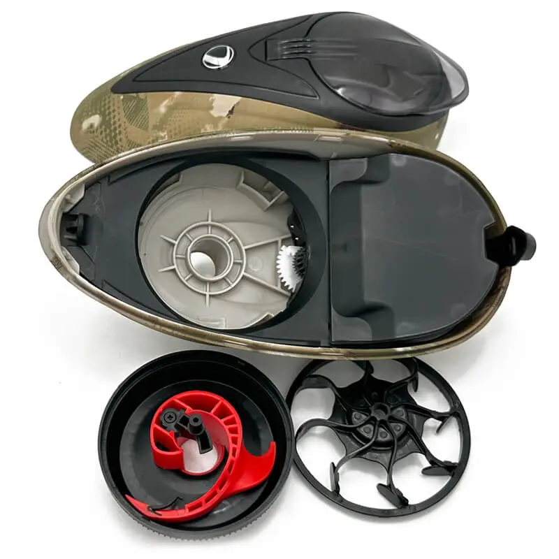 Paintball loader with disassembled internal components.