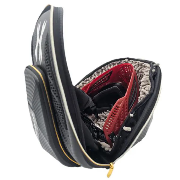 Open travel case with organized interior compartments.