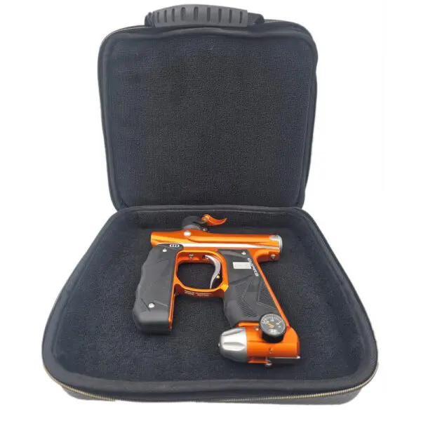 Orange paintball gun inside a black case.