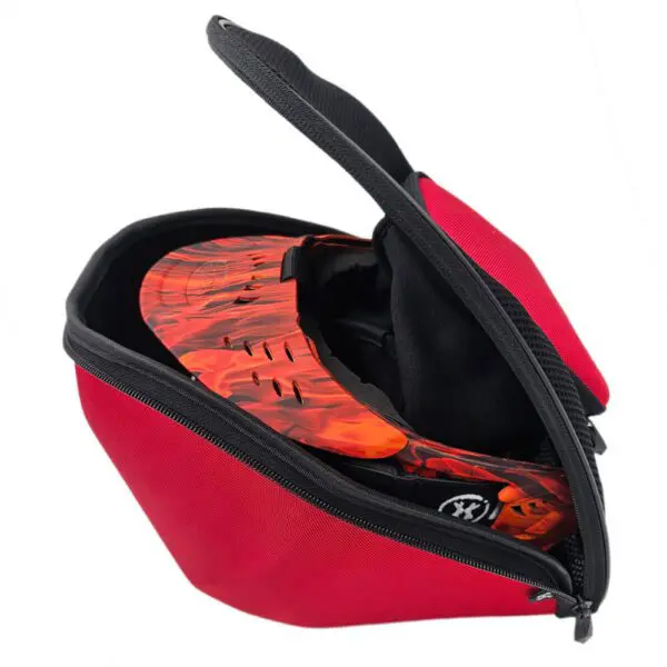 Red bag with open zipper, containing helmet.