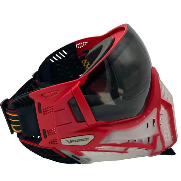 Red and white paintball mask, side view.