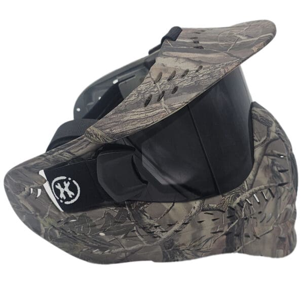 Camouflage paintball mask with visor.