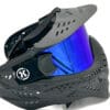 A close up of the side of a paintball mask