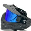 Black paintball mask with blue lens