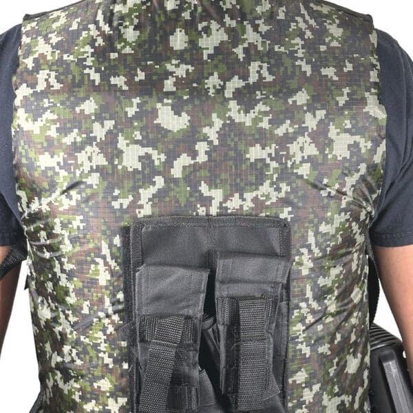 Camouflage tactical vest with pouches.