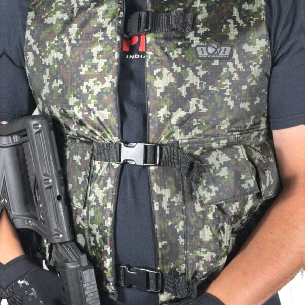 Camouflage vest with black straps and gun.