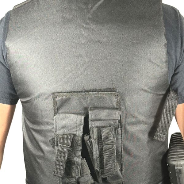 Black tactical vest with magazine pouches.