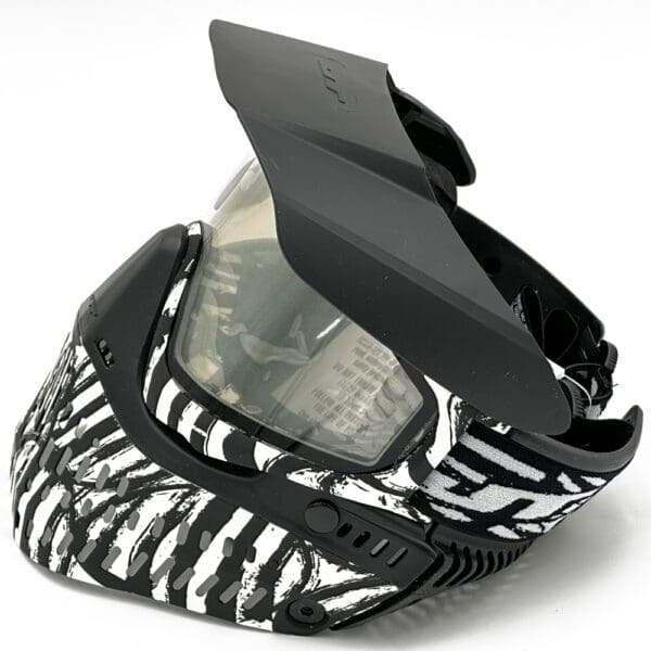 Black and white paintball mask with visor.