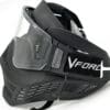 Black paintball mask with clear lens.