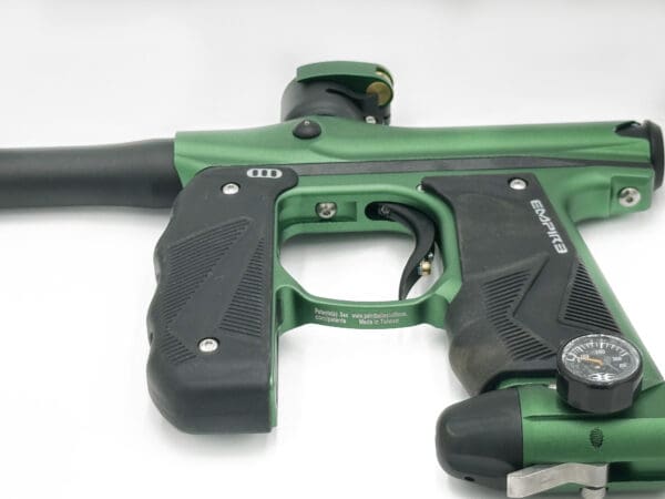 Green Empire paintball marker with gauge.