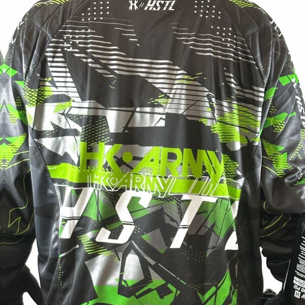 Black and green graphic long-sleeve shirt.