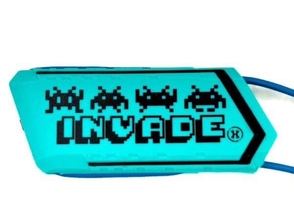 Blue and black 'Invade' keychain with space invaders.