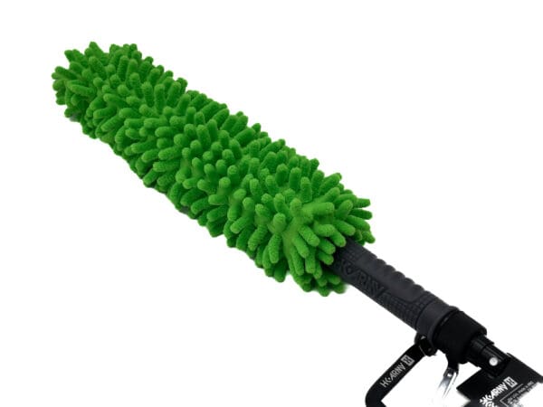 Green microfiber car cleaning brush with handle.