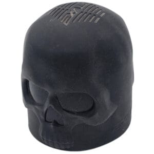 Black skull-shaped Bluetooth speaker.