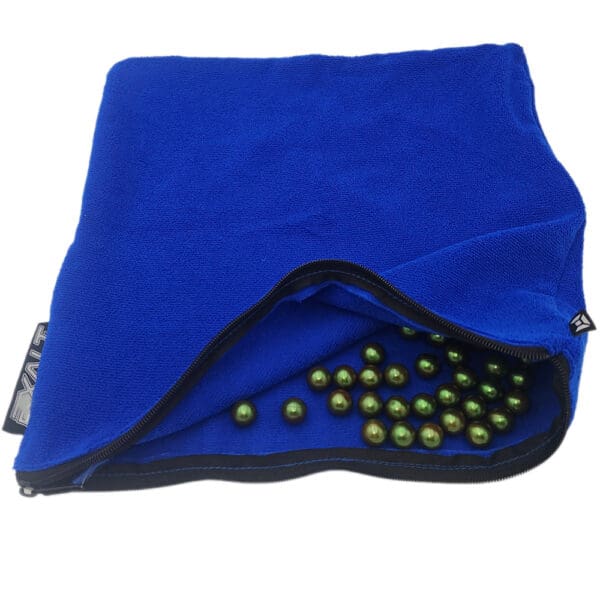 Blue bag filled with green marbles.