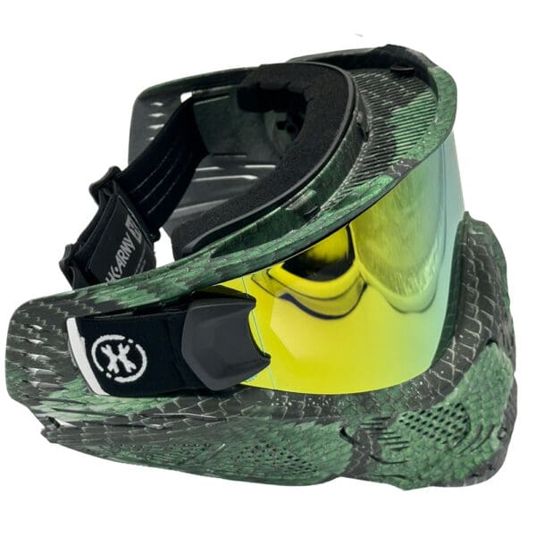 Green camo paintball goggle with yellow lens.