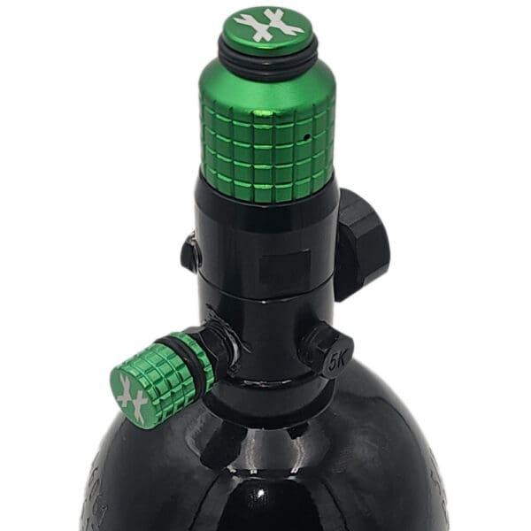 Green and black paintball tank regulator.