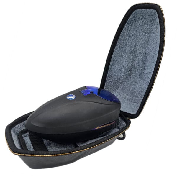 Black paintball hopper in carrying case.