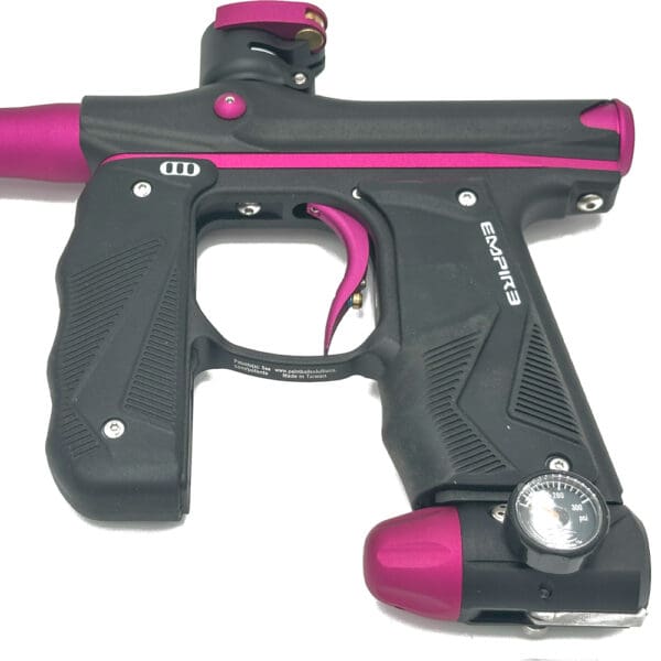 Pink and black Empire paintball marker.