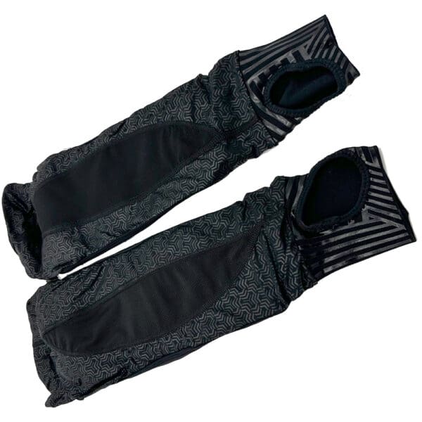 Pair of black patterned arm warmers.