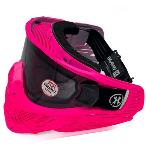 Pink paintball mask with thermal lens.