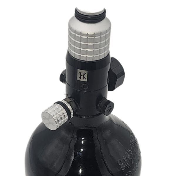 Black paintball tank with silver regulator.