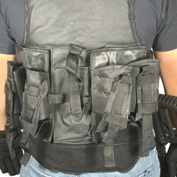 Black tactical vest with multiple pouches.