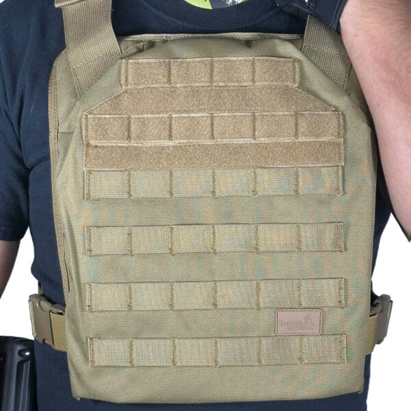 Tactical vest with MOLLE webbing.