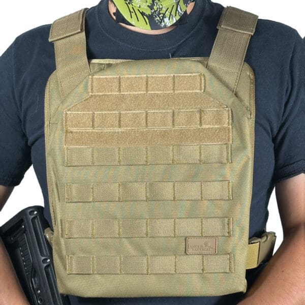 Tan tactical vest with molle webbing.