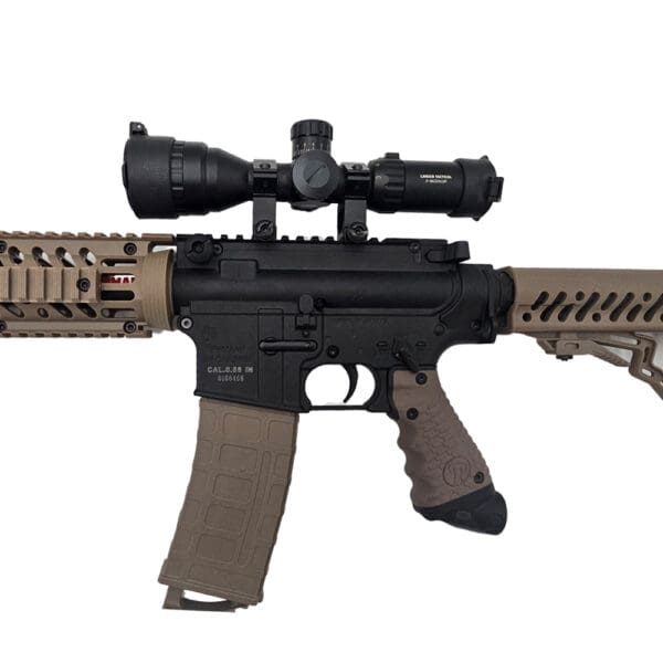 Tan AR-15 rifle with scope.