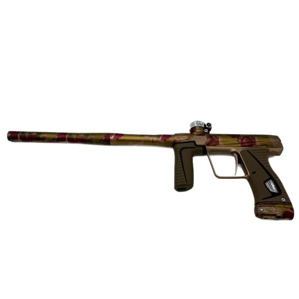 Camouflaged paintball gun on white background.