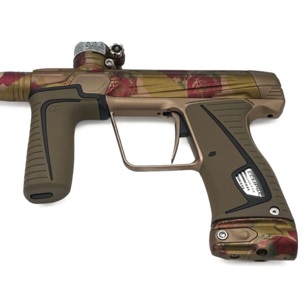 Brown and red camo paintball gun.