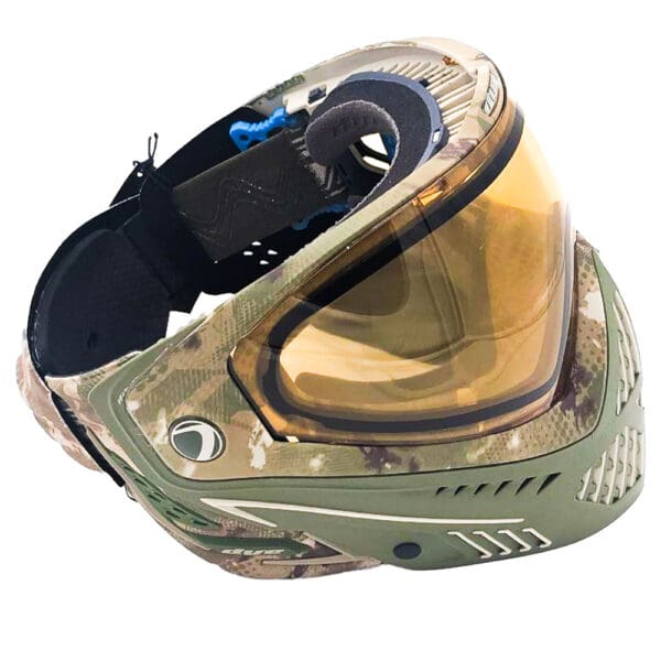 Camouflage paintball mask with tinted lens.