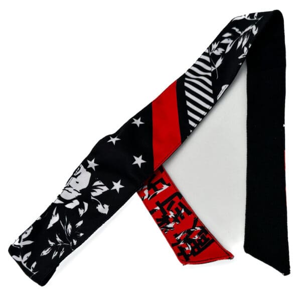 Black and red patterned headband.