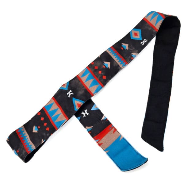 Black and blue patterned guitar strap.