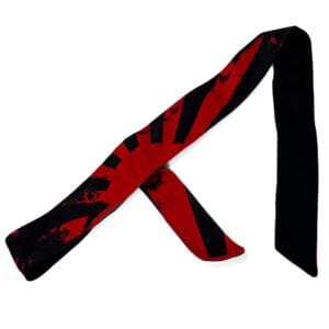 Red and black patterned headband.