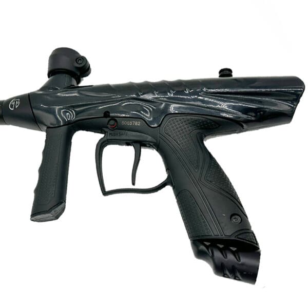 Black paintball marker with grip.