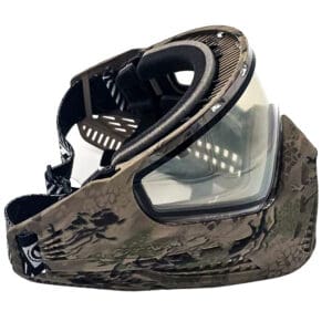 Camouflaged paintball mask with clear lens.