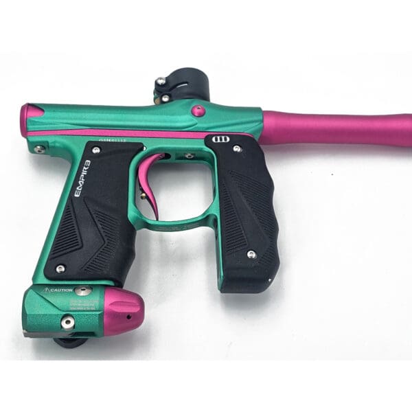 Green and pink paintball marker.