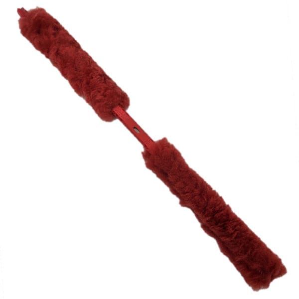 Red wool firearm cleaning rod.