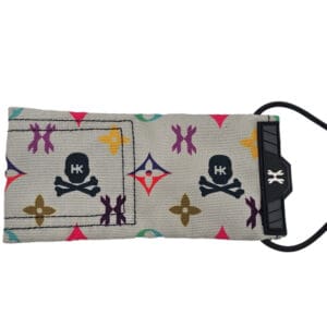 Here's an alt tag for the image: Colorful skull and monogrammed fabric wristband.