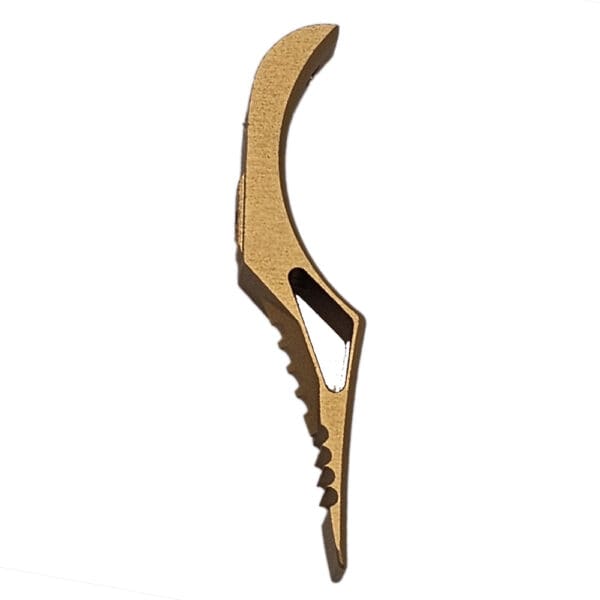 Gold-colored serrated firearm charging handle.