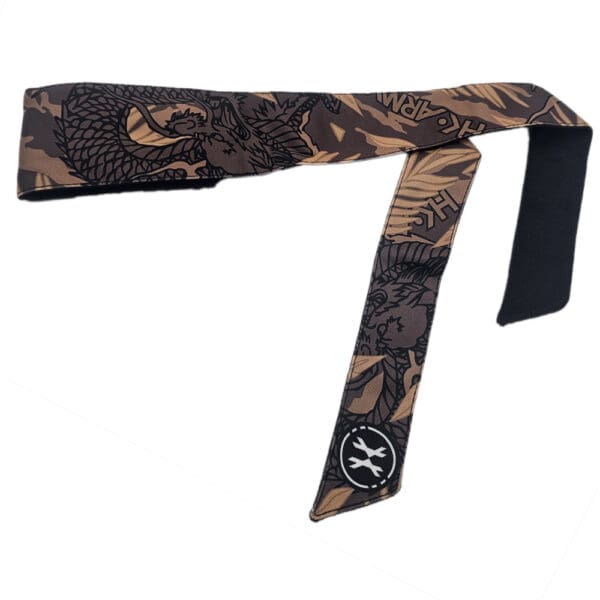 Tan dragon headbands with black logo.