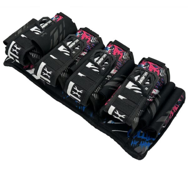 Here's an alt tag for the image: Six-pod paintball harness, pink and black.