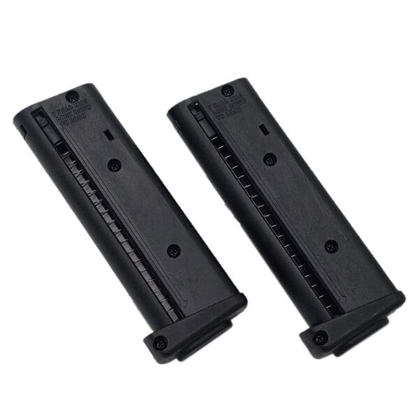 Two black gun magazines; 7 rounds.