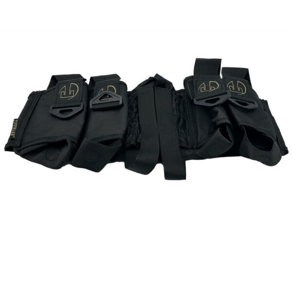 Black Tippmann paintball harness with pouches.