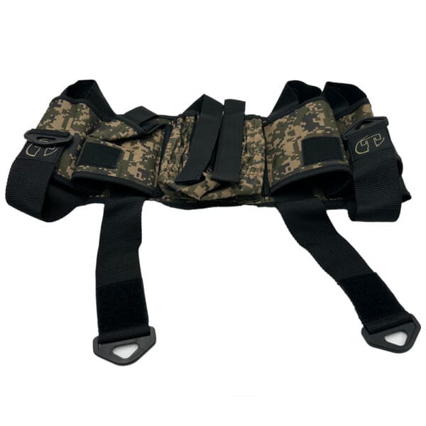 Camouflage paintball harness with pouches.