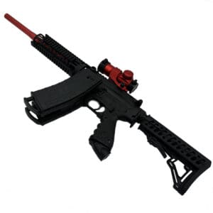 Black paintball marker with red scope.